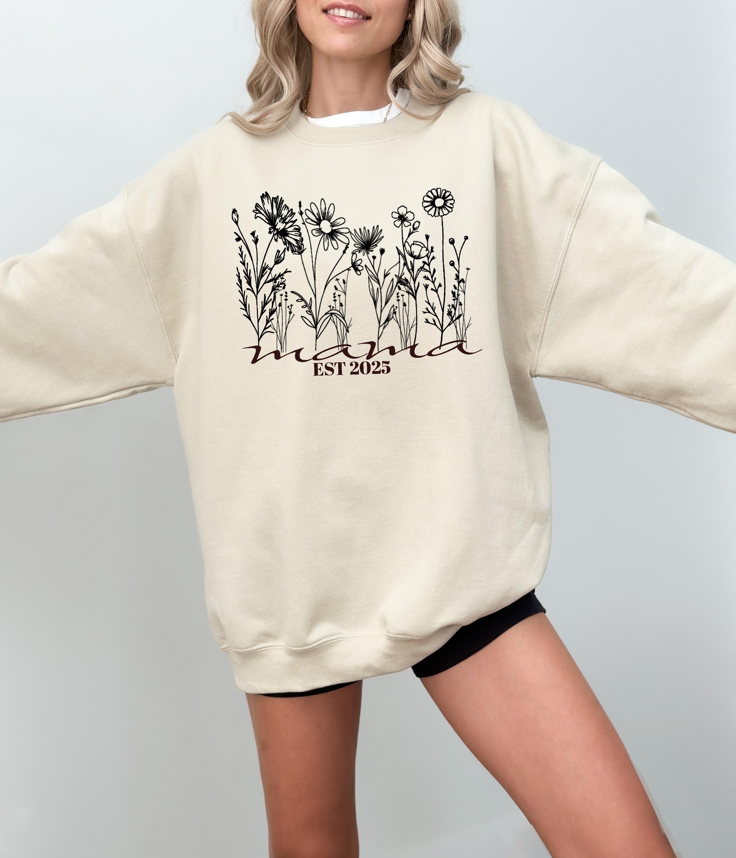 a woman wearing a sweatshirt that says est est est est est est est est est