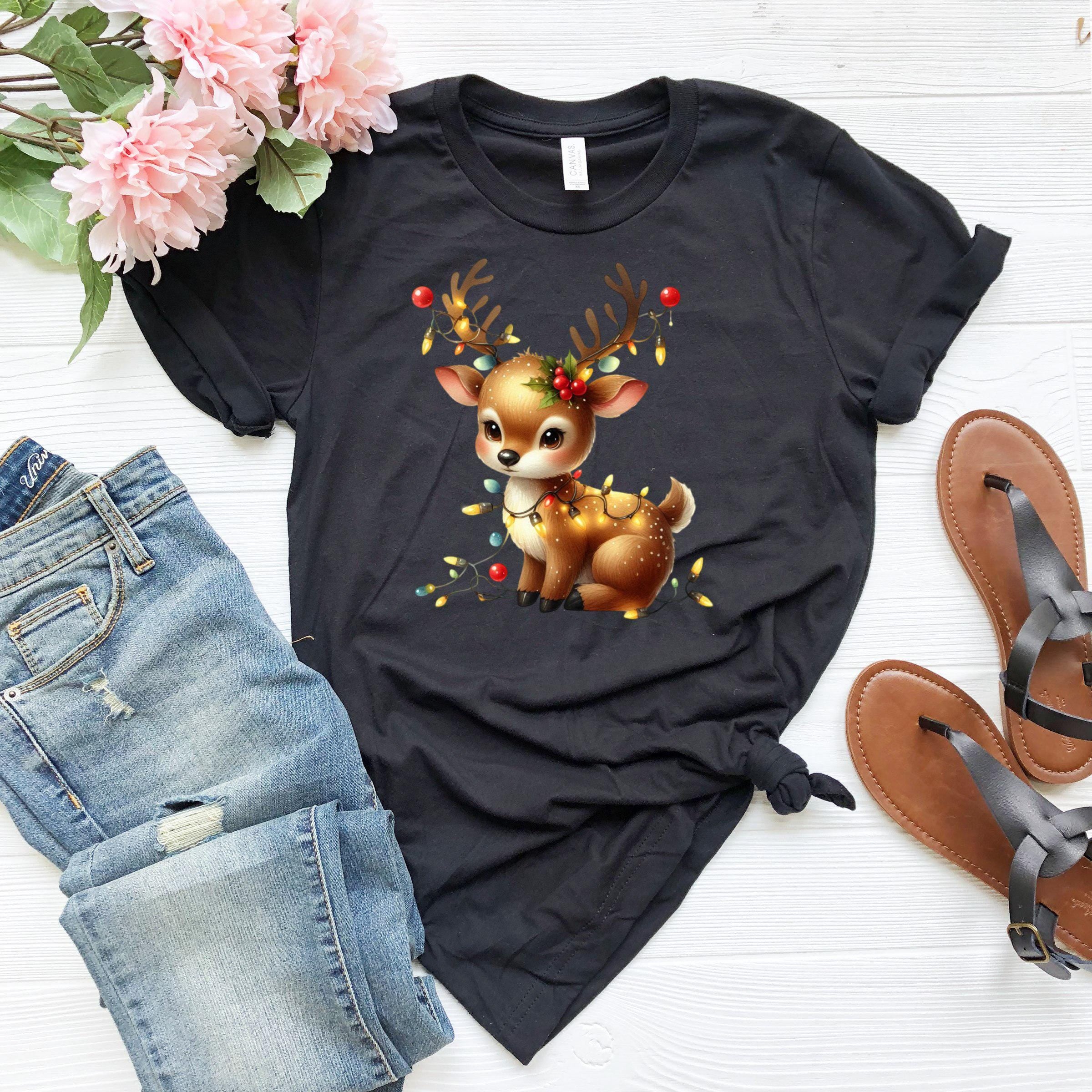 a t - shirt with a deer and christmas lights on it