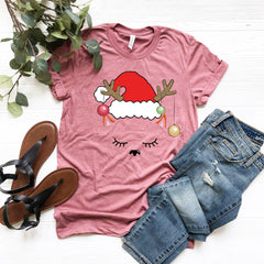 a t - shirt with a santa hat on it