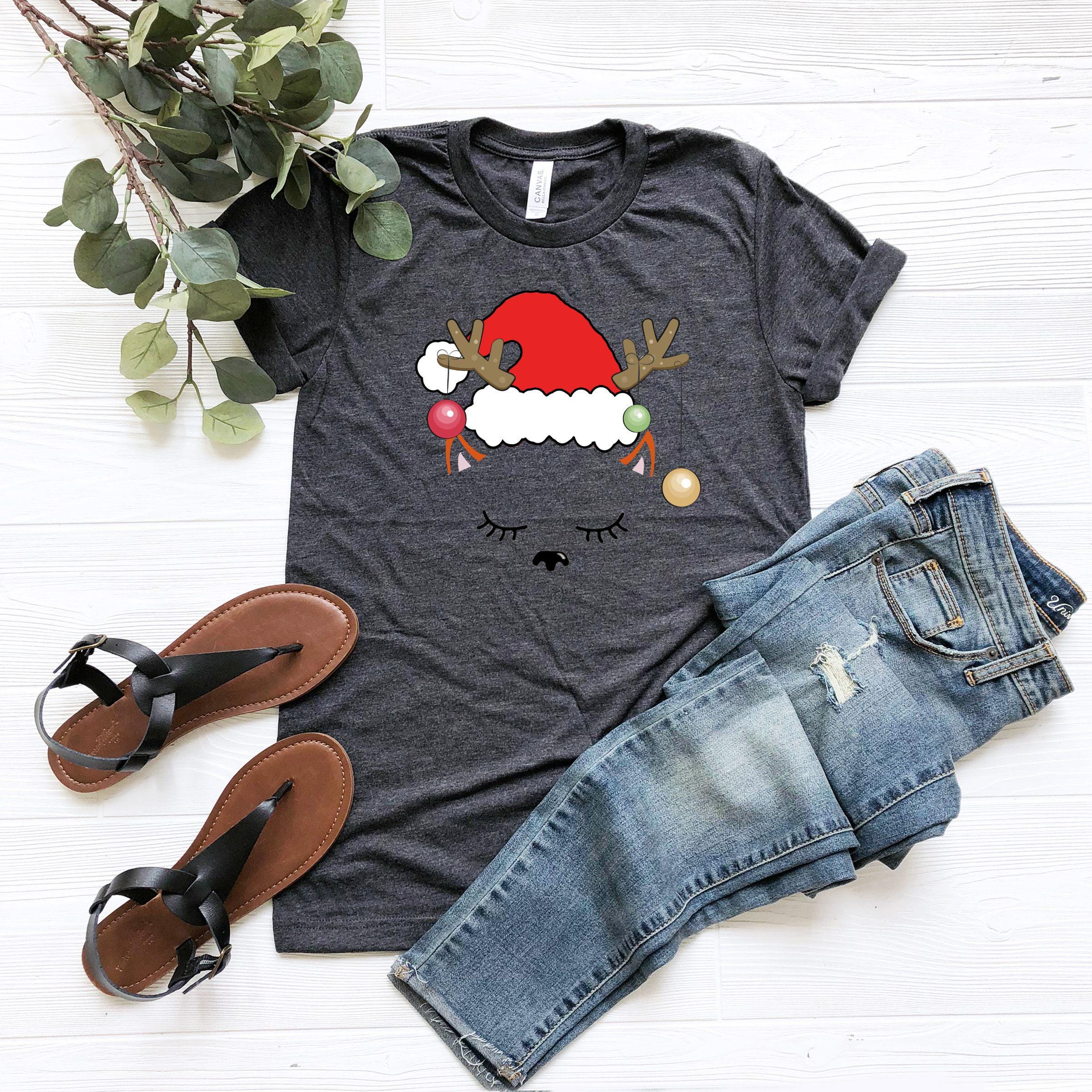 a t - shirt that has a santa clause on it