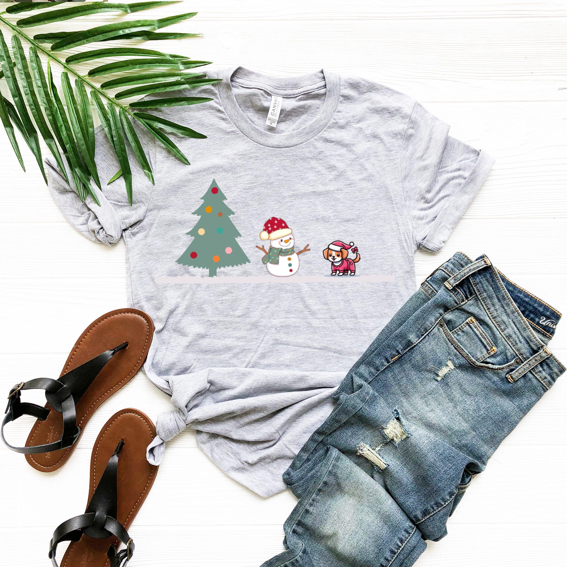 a t - shirt with a christmas tree and two snowmen on it