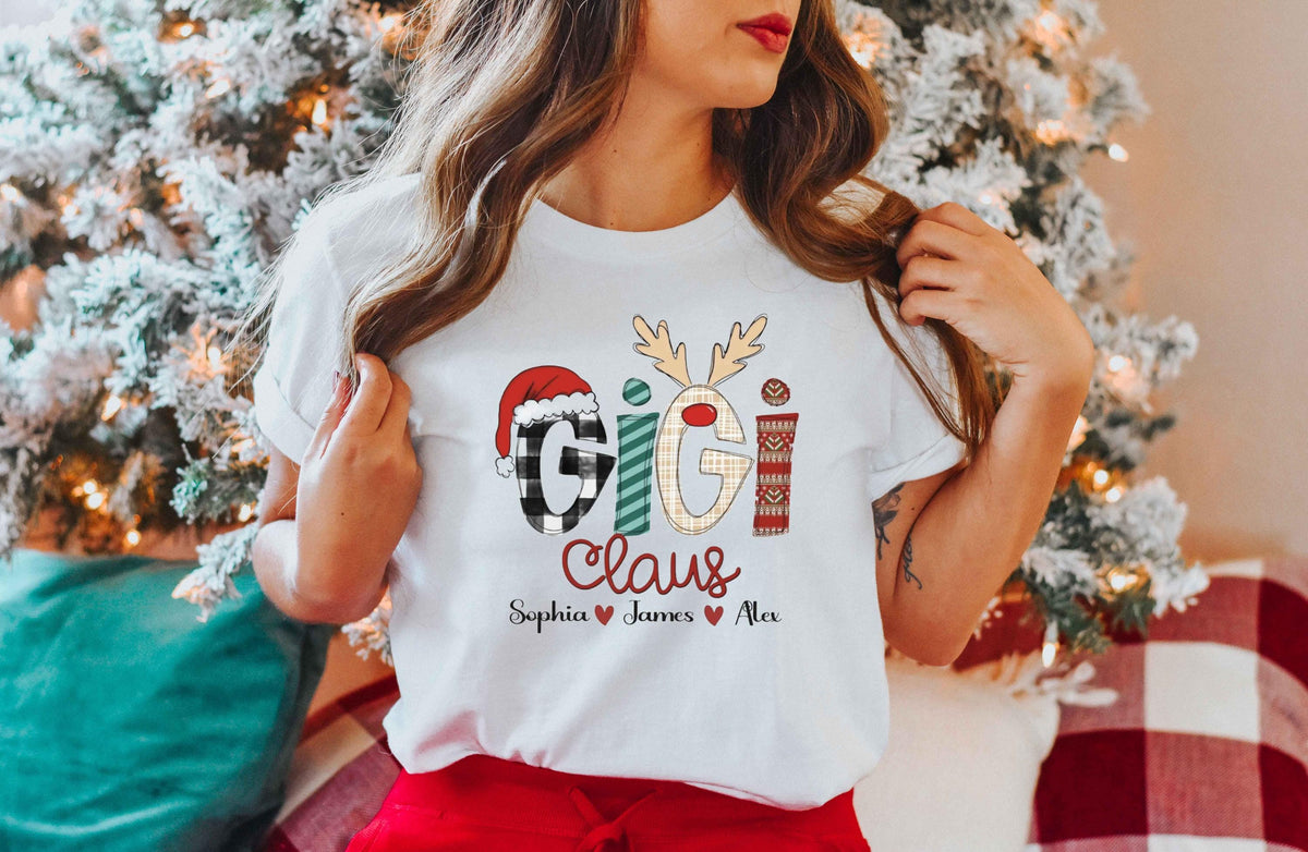 a woman standing in front of a christmas tree