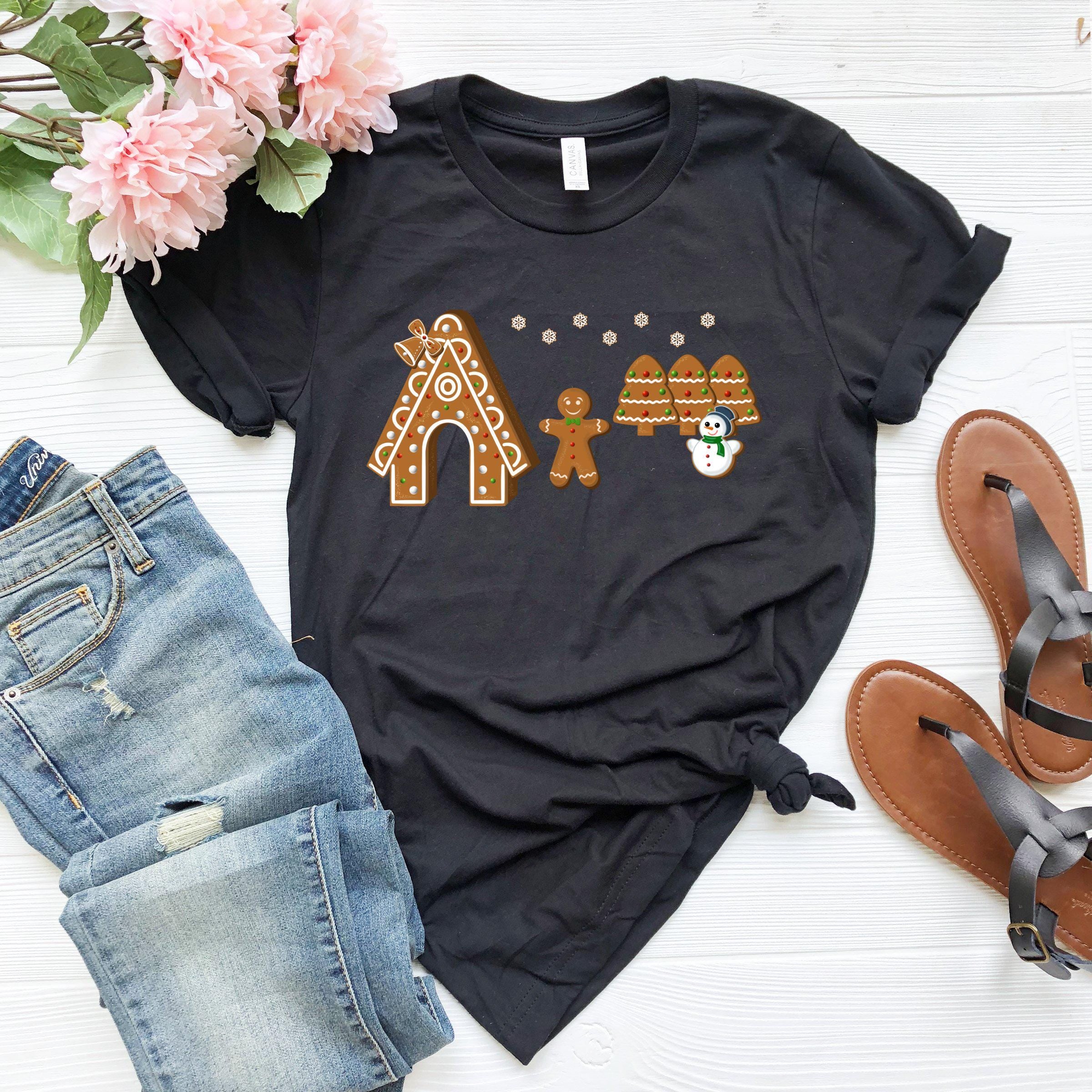 a black t - shirt with ginger cookies on it