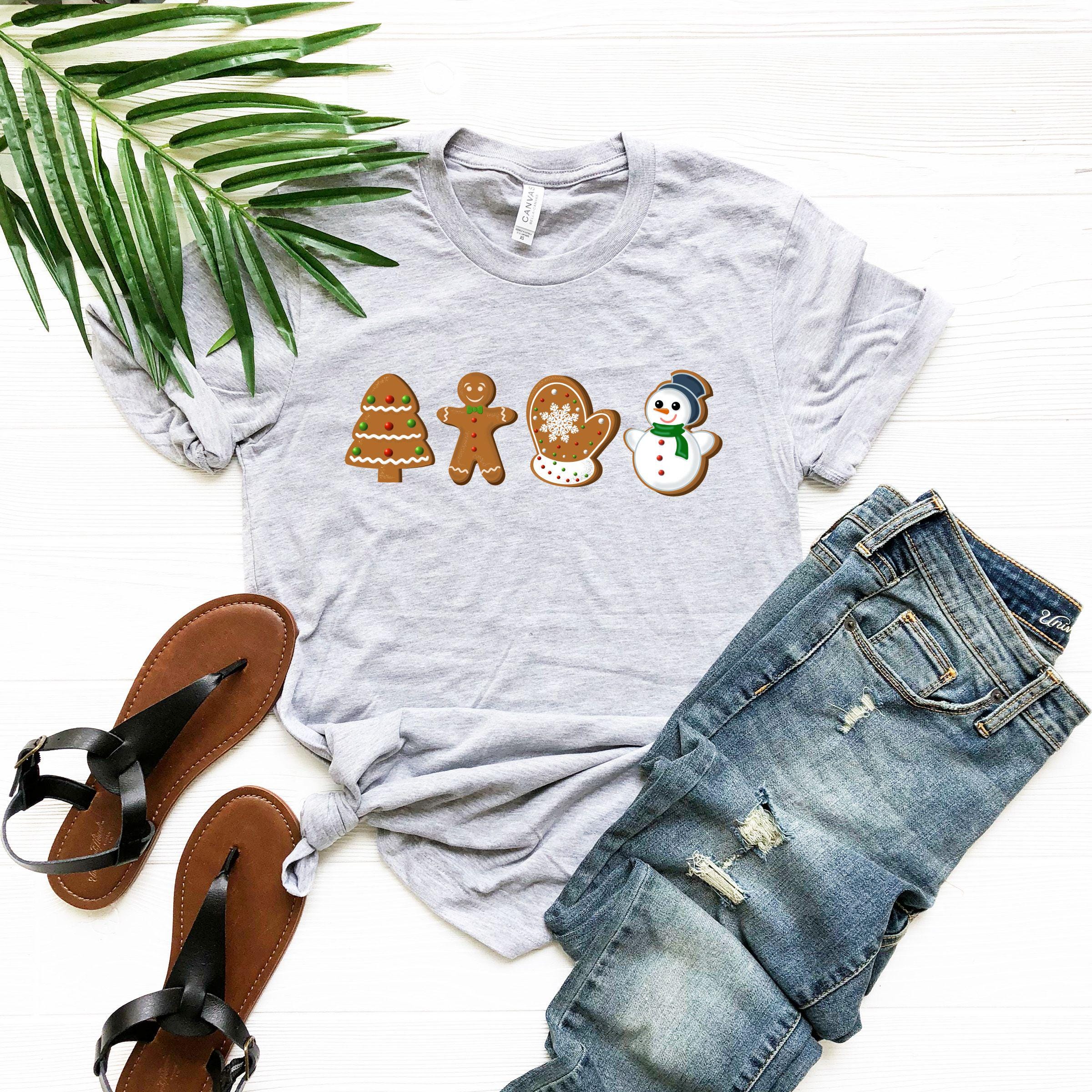 a t - shirt with three gingers and a snowman on it