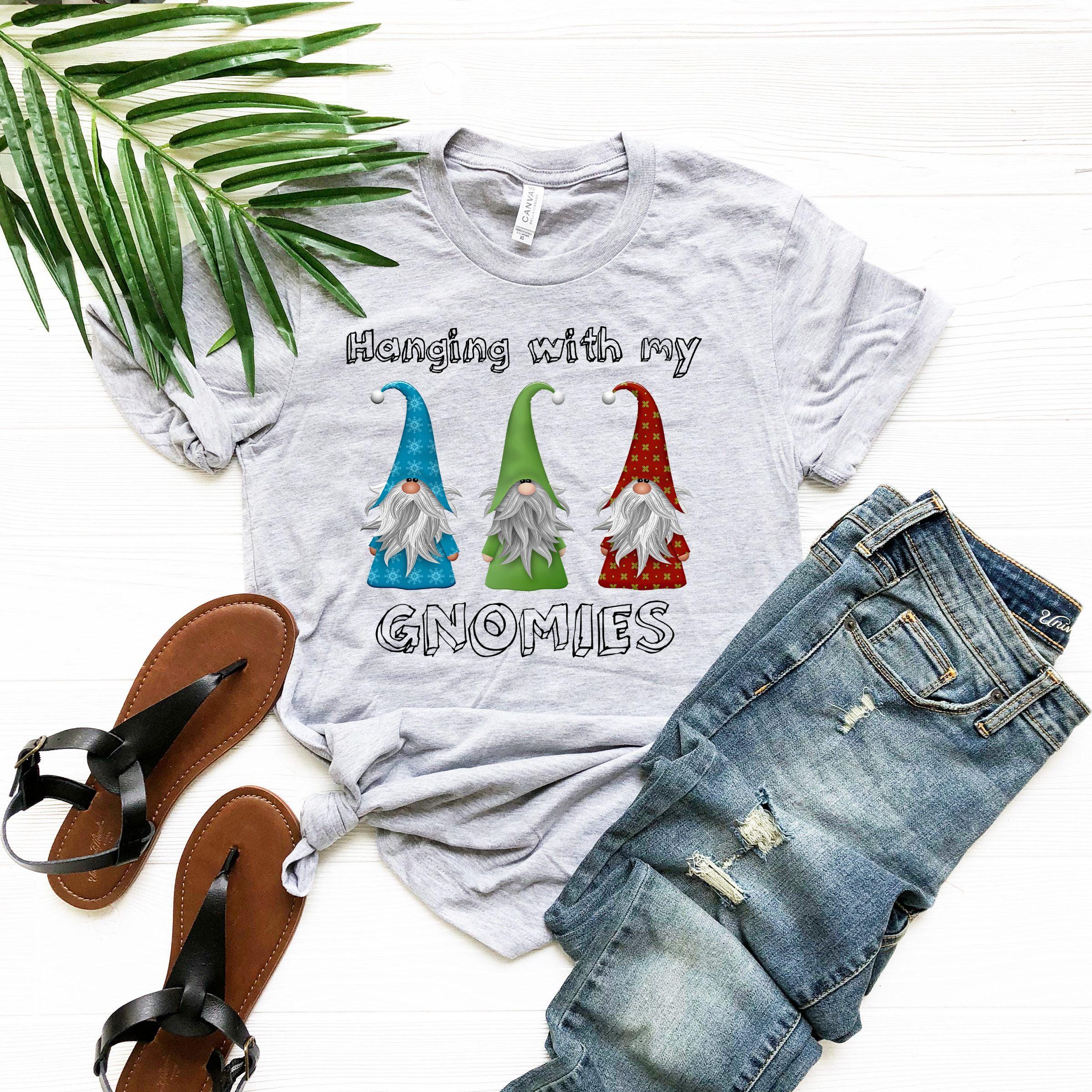 a t - shirt with three gnomes on it