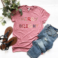 a t - shirt that says happy birthday on it next to a pair of jeans