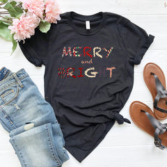 a t - shirt with the words merry and bright on it