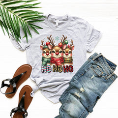 a t - shirt that says oh oh oh with three deers wearing christmas sweater